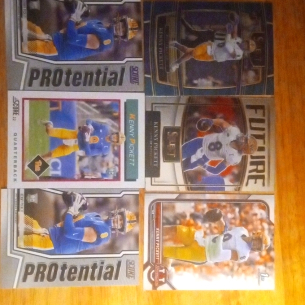 Six Kenny Pickett rookie cards.
